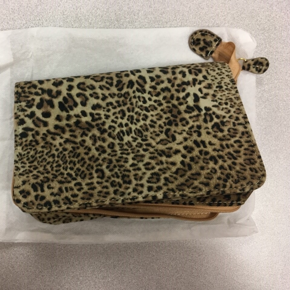 NWOT Leopard Jewelry Case-4 sections, with exterior zipper to securely close